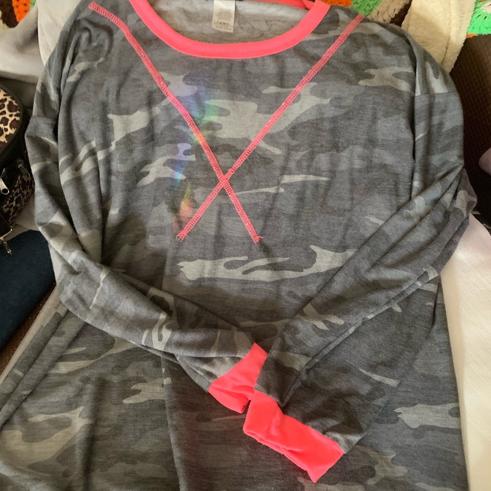 A shirt camo it is new not worn